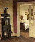 Carl Vilhelm Holsoe Canvas Paintings - An Interior with a Stove and a View into a Dining Room